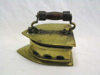 A large old brass box iron