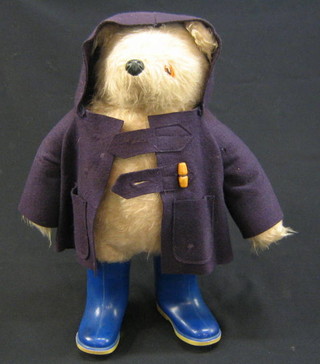 A Paddington Bear with blue Wellingtons
