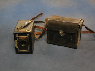 An Ensign box camera in leather case