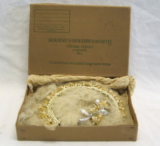 A Bourne & Hollingsworth wedding headpiece with veil, boxed
