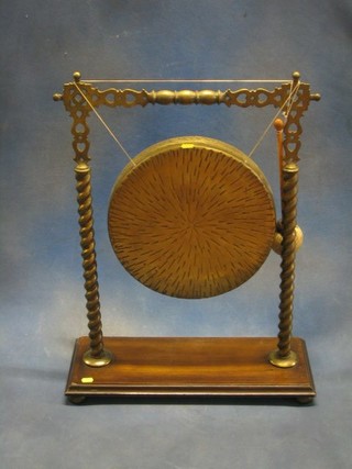 An oak and brass dinner gong