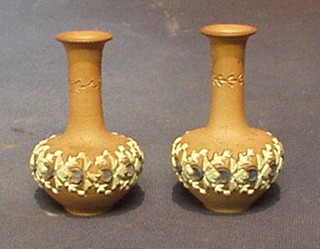 A pair of miniature Doulton Silica club shaped vases, the base marked X5143 3"