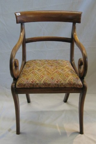 A harlequin set of 5 Regency bar back dining chairs with plain mid rails and upholstered drop in seats, on sabre supports (2 carvers, 3 standard)