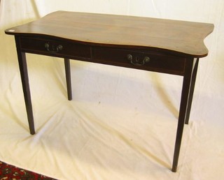 A Georgian mahogany serpentine fronted side table, with 2 short drawers with brass swan neck drop handles, raised on square tapering supports 46"