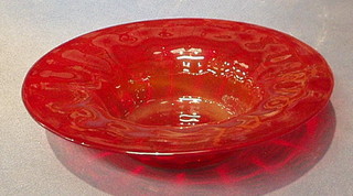 A Whitefriars circular Ruby Wrythen Pattern glass bowl 11"