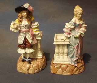 A pair of 19th Century Continental porcelain spill vases in the form of gallant and belle standing by a balcony, the base with anchor mark and impressed EBS 9"