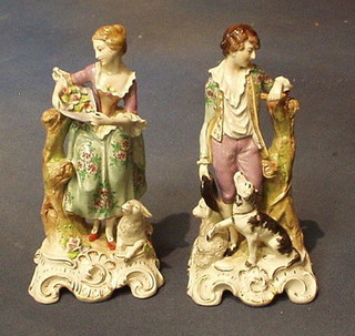 A pair of Continental porcelain figures Shepherd and Shepherdess, the base with crown S mark 7"