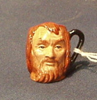 A Royal Doulton tiny character jug "Fagin" D6679