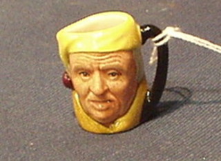 A Royal Doulton tiny character jug "Scrooge" D6683