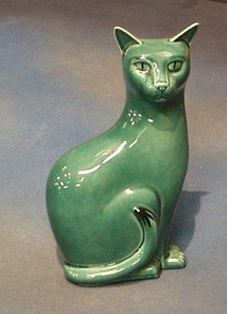 A Poole pottery figure of a seated turquoise cat, the base impressed with a capital L 11"