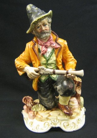 A Capo di Monte figure of a seated huntsman, the base marked Made In Italy