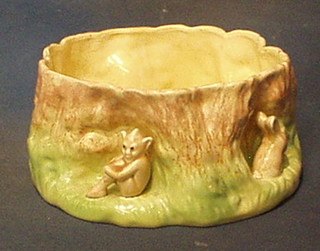 A circular Sylvac vase in the form of a tree stump, the base marked Sylvac 1514 8" (chipped)