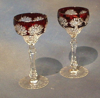 A set of 7 Bohemian red glass long stemmed hock glasses