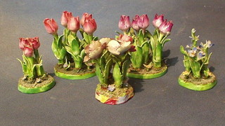 5 pottery floral ornaments in the form of tulips