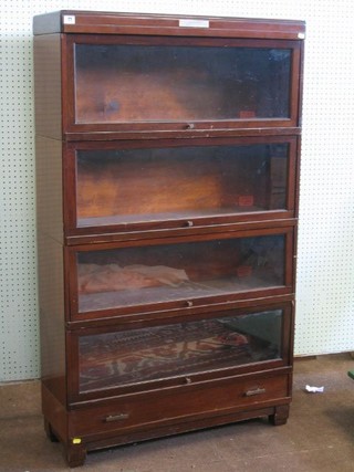 A 4 tier mahogany Globe Wernicke style bookcase, the base fitted a drawer, 34"
