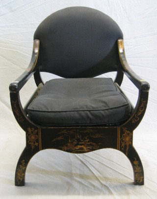 A 1930's lacquered chinoiserie style open arm chair with woven cane seat, upholstered grey material