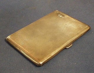 A silver cigarette case with engine turned decoration Birmingham 1938