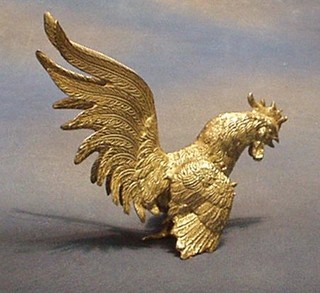 A silver plated table ornament in the form of a fighting cock 7"
