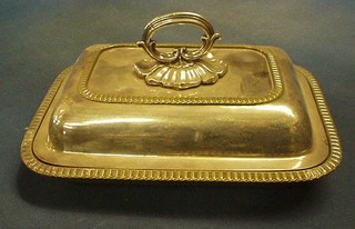 An oblong silver plated entree dish