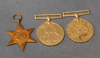 A group of 3 medals comprising 1939/45 Star, British War medal and Defence medal