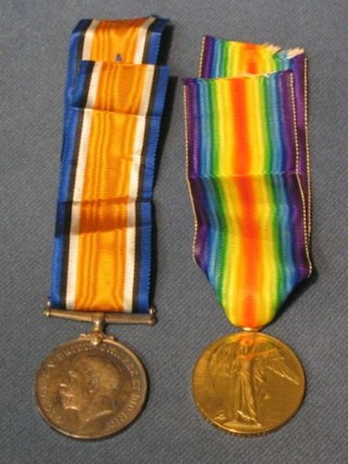 A pair - British War medal and Victory medal to 966143 Gunner C A Perry Royal Artillery complete with original dispatch paper carton