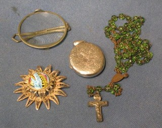 A quizzing glass, a Rosary, a Continental enamelled and filigree brooch and a silver plated locket