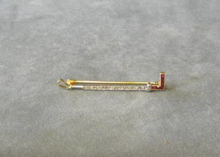 An 18ct gold stick pin bar brooch in the form of a riding crop, the handle set baguette cut rubies, the stick set diamonds