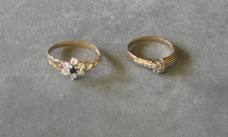 A lady's gold dress ring set sapphire and 6 white stones together with a gold dress ring (2)