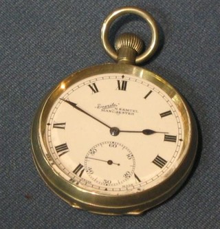 An open faced pocket watch in a silver plated case