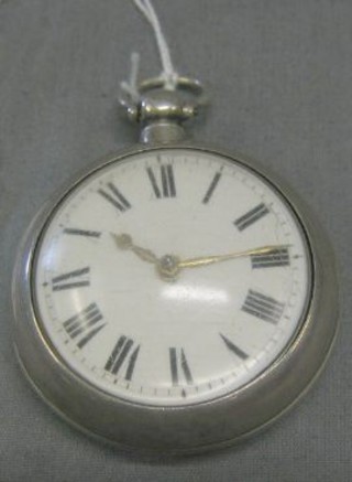 A fusee open faced pocket watch with enamelled dial and Roman numerals contained in a silver pair case by W D Barker of 54 West Street, Horsham, contained in a silver case