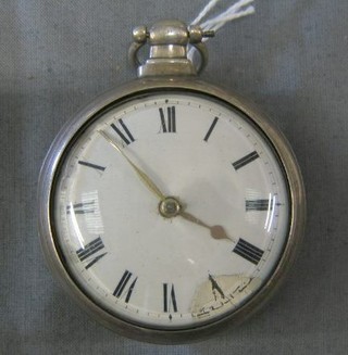 A fusee pair cased pocket watch contained in a silver case with repair paper from Herbert Barker of 13 Queens St. Horsham