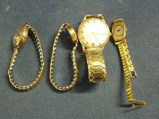 A gentleman's gold wristwatch and 3 lady's gold wristwatches