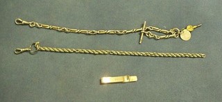 2 silver watch chains together with a silver tie clip