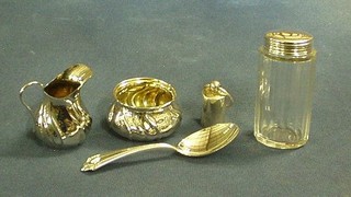 A cut glass pin jar with silver lid 3", a silver caddy spoon, a modern silver Continental jug and bowl and a silver ferrel