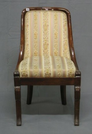 A Regency Empire style tub back chair with upholstered seat, on scrolled supports