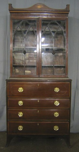 A handsome Georgian mahogany Secretaire bookcase, the upper section with moulded cornice fitted adjustable shelves enclosed by astragal glazed panelled doors, the base with well fitted secretaire drawer above 3 long drawers, raised on splayed bracket feet, inlaid throughout 37"