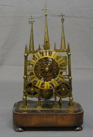 A 19th Century striking double fusee skeleton clock in the form of a cathedral with silvered chapter ring, Roman numerals by Rhodes of Bradford