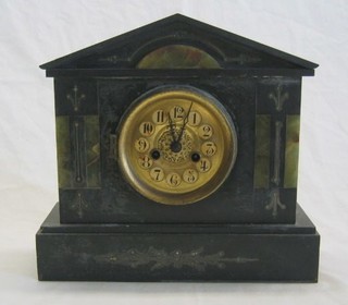 A 19th Century French striking mantel clock contained in a black veined marble architectural case