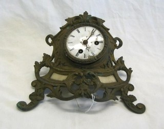 A 19th Century French 8 day striking mantel clock contained in a gilt metal and onyx case