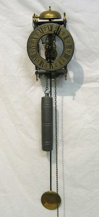 A reproduction iron hanging 30 hour  striking lantern clock