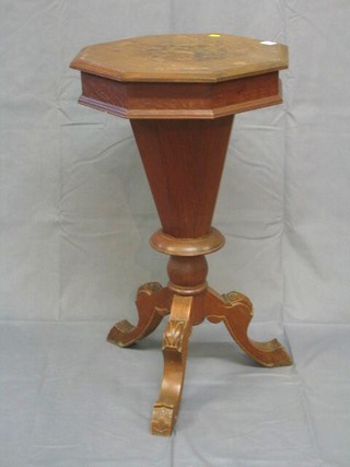 A Victorian bleached mahogany work table of octagonal conical form, raised on pillar and tripod supports 18"
