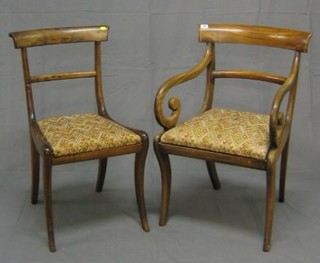A harlequin set of 5 Regency bar back dining chairs with plain mid rails and upholstered drop in seats, on sabre supports (2 carvers, 3 standard)