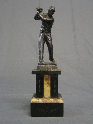 A 1930's spelter figure of a golfer, raised on a 2 colour marble base 13"