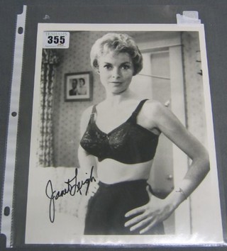A signed black and white photograph of Janet Leigh in a scene from the film Psycho