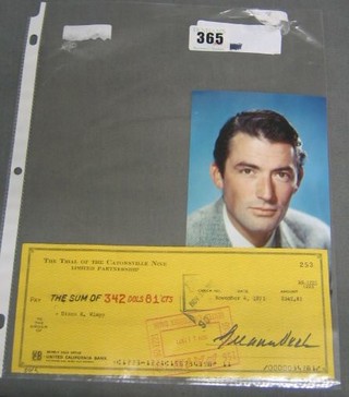 A  colour portrait photograph of Gregory Peck together with a United California Bank cheque for the Trial of The Catonsville 9 Ltd Partnership Pay the Sum of $342.81 Dixon R Wimpey dated 4 November 1971