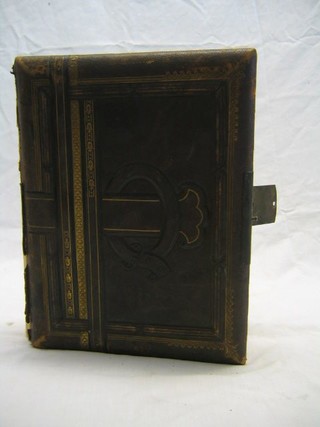 A Victorian leather bound musical photograph album
