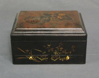 An Oriental lacquered jewellery box with hinged lid, the base fitted 2 drawers 10"