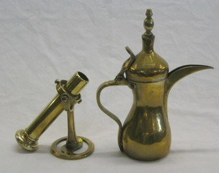 A 19th/20th Century brass ships gimbled candle or lamp holder 8" and a brass Turkish coffee pot 12"