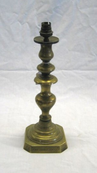 A 19th Century brass candlestick, the base engraved "To The Prince Albert or Friendly Society of Car Proprietors" converted to an electric table lamp 12"
