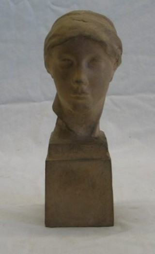 A terracotta head and shoulders portrait bust of a classical lady, raised on a square base, the interior marked Frederick Lessore 10"